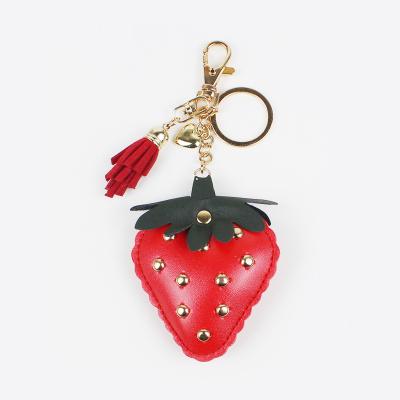 China Promotional Giveaway Gift Studded Strawberry Key Chain With Tassel for sale