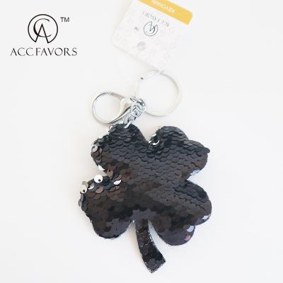 China Fashionable Leaf Clover Reflective Lighter Four Key Chain for sale