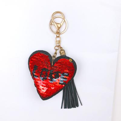 China Wholesale Natural And Fresh Women Handbags Accessories Heart Shape Two Color Sequins Tassels Cotton - Filled Key Chain for sale