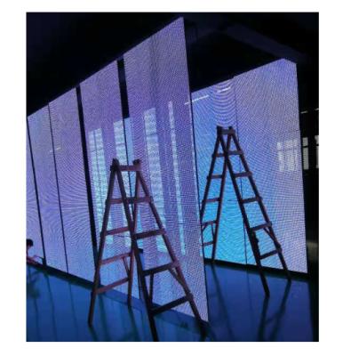 China the newest waterproof indoor P31.25 led curtain transparent led display mesh for advertising for sale