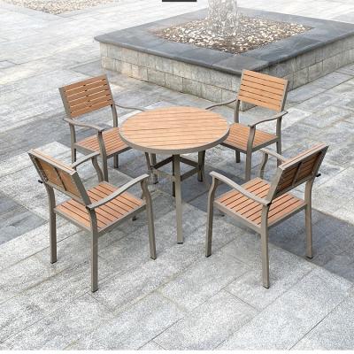 China Eco-friendly\UV Resistant\Water Proof\Weather Resistant Waterproof Popular Plastic Wooden Furniture For Outdoor All Weather Used Dining Round Table And Chair for sale