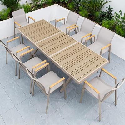 China Modern Design Commercial Multifunctional Table Plastic Wood And Aluminum Bracket Extendable Dining Table for sale