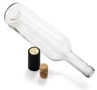 China Clear Beverage 750ml Wine Bottles Glass Bottles With 12 Corks And PVC Shrink Caps for sale