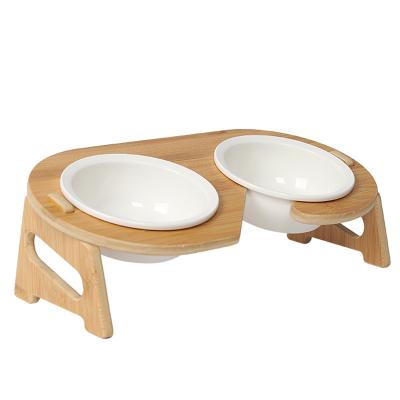 China Sustainable Wooden Table Cat Ceramic Bowls Pet Dining Cat Feeder Bowl with Raised Bamboo Stand for sale