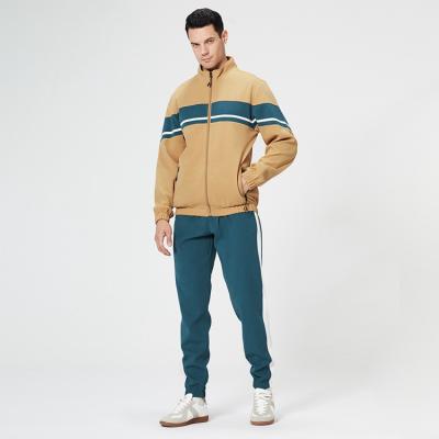 China Autumn Plus Size Matching Color Fashion Sweatsuit Casual Loose Tracksuit CAUSAL Sportswear Jacket For Men for sale