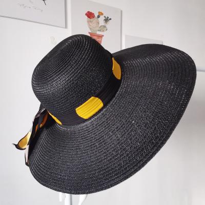 China 2021 Image Factory Wholesale Fashion Panama Hats Black Straw Hat With Big Dots Ribbon Decoration for sale