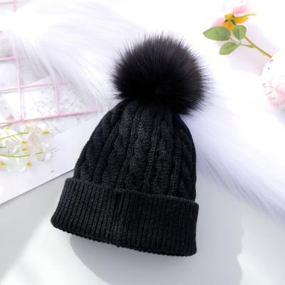 China Lovely Winter COMMON High Quality Solid Pompom Knitted Beanie Hat For Kids for sale