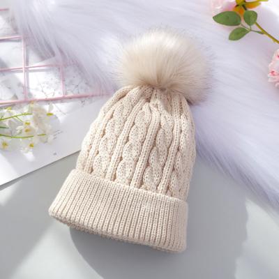 China Lovely JOINT wholesale solid knit cap hats for kids winter beanie hats with pom for sale