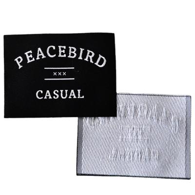 China Durable Black Adhesive Fabric Labels Fabric Labels For Clothing Woven Label Tags for sale