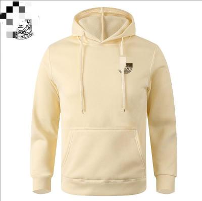 China Anti-Wrinkle Long Sleeves Unisex Solid Colores Fashion Women And Men Thick Hoodies With Kangaroo Pocket for sale