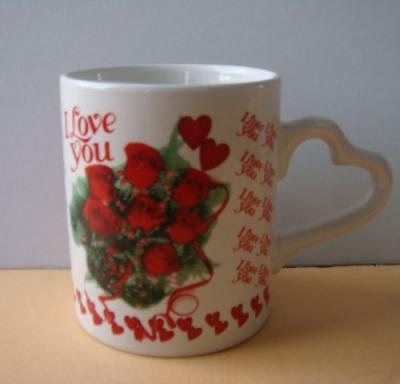 China Viable creative good quality and practical ceramic mug with the heart shape handle for sale