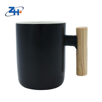 China Hot Selling High Quality Sustainable Pure Black Luster Colored Mug With Wooden Handles for sale