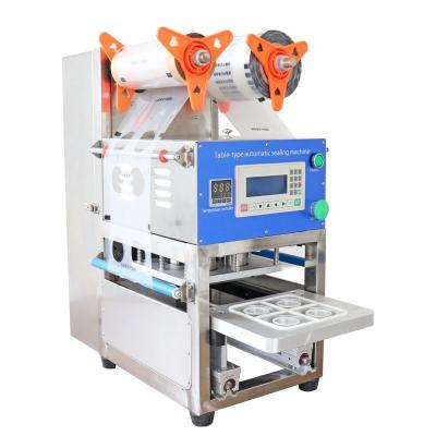 China Automatic Plastic Juice Filling Sealing Machine Beverage Cup Lid Sealer Machine for sale