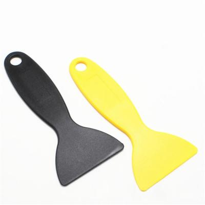 China Convenient And Durable Cheap Yellow ABS Plastic Kitchen Scraper Putty Knife Film Automotive Scraper for sale