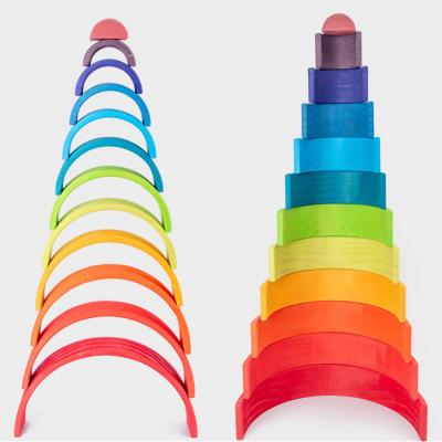 China Building Toy 12 Pieces Large Rainbow Wooden Stacker Interlocking Puzzle Blocks Educational Toys for sale