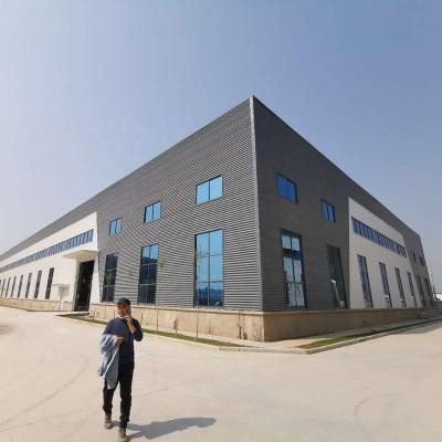 China Linyi tcgg steel structure PEB steel structure construction industrial steel prefab warehouse for sale