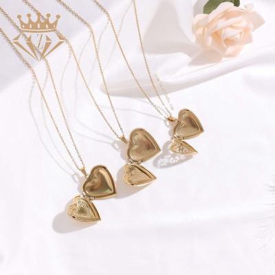 China DIY Couples Environmentally Friendly Exquisite Flower Shaped Cavity Photo Stainless Steel Love Photo Frame Heart Necklace for sale