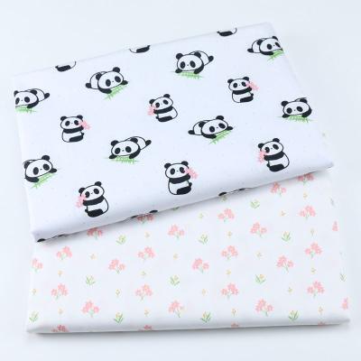 China Small crib wholesale products organic panda fabric kindergarten bag floral printing neonatal cotton fabric for sale