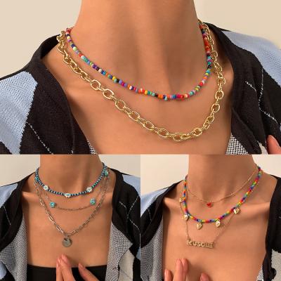 China FASHIONABLE Retro Color Seed Alloy Beaded Chain Layered Simple Letter Tassel Necklace Love Pendant Necklace for sale