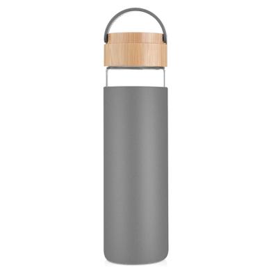 China 20oz Sustainable Reusable Glass Wide Mouth Water Bottle With Protective Silicone Sleeve And Bamboo Carry Lid for sale