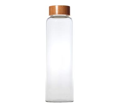 China High Borosilicate Glass Water Bottle 32oz Viable Eco Friendly Glass Drinking Bottle With Bamboo Lid For Fruit Water for sale