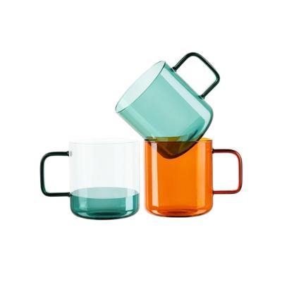 China Sustainable 350ml Colored Coffee Mug Drinking Glass Glass Tea Cup With Handle for sale