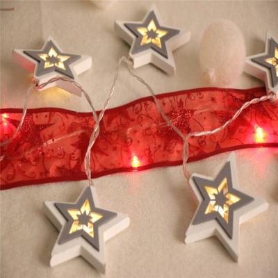 China Copper Wooden Garland Christmas Tree Decoration Holiday Battery Operated Star Shape Led String Lights for sale