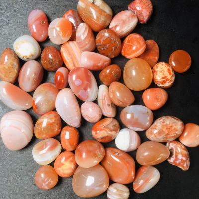 China China Wholesale Natural Polished Carnelian Tumbled Healing Red Palm Gemstones Cheap Tumble Stone Agate Gifts for sale