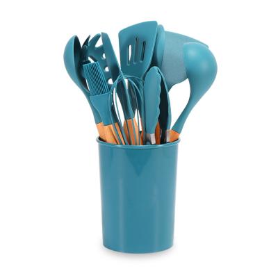 China Wholesale Portable Multifunctional Stocked Kitchen Utensils Set Silicone Cooking Utensils Set With Wooden Handle for sale