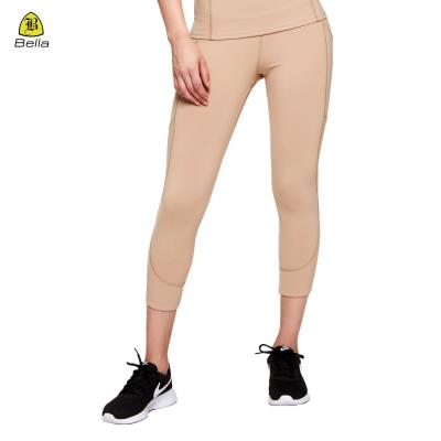 China High Quality Breathable Yoga Leggin Naked Waist Capri Top With Pockets Cropped Gaiters for sale