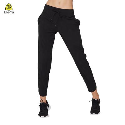 China Spring Breathable Breathable Outdoor Fitness Waistband Sports Pants Sweat-wicking Running Pants With Pockets for sale