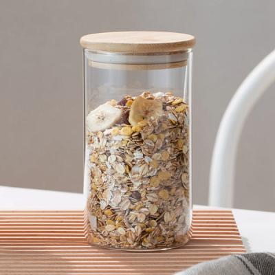 China 25 Oz Borosilicate Glass Storage Containers Transparent Jar With Bamboo Lid for sale