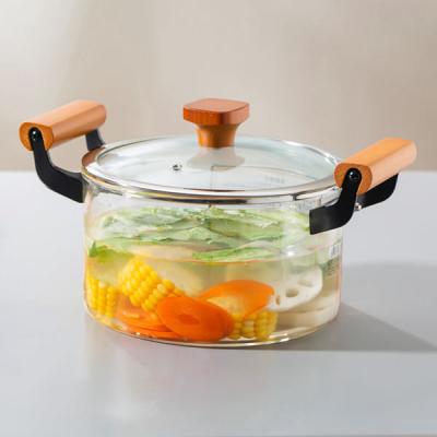 China la cocina clara del vidrio de Borosilicate 2.2L tiene cuidado con cocinar la mano a prueba de calor del pote soplada en venta