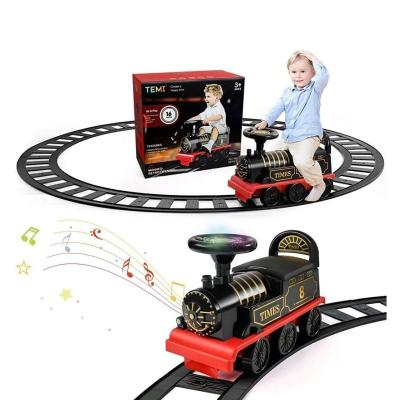 China Slot Toy Electric Train Kids Riding Toy With Light And Sound For Toddlers for sale