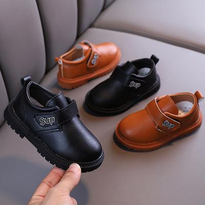 China Latest Boys Thermal Wholesale Black Genuine Leather School Flat Unisex Shoes For Kids for sale