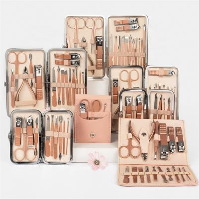 China Pink Flexible Men's Professional Women's Manicure Tools Suitcase Nail Cutter Clipper Kit Pink Manicure Pedicure Set for sale