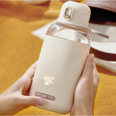 China New Wireless Design Usb Multi Temperature Settings Milk Bottle Warmer Portable Infant Formula Bottle Modulator for sale