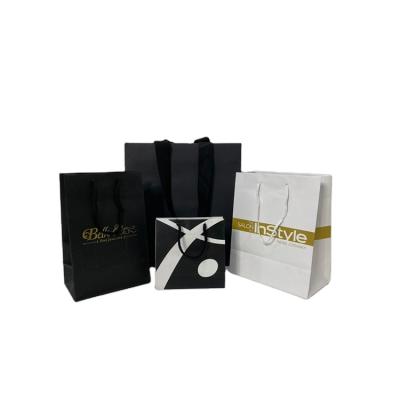 China Recyclable Customized Branded Paper Bag Brand Paper Shopping Bag Boutique Branded Paper Bag With Ribbon for sale