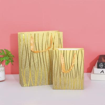 China Recyclable Luxury Custom Printed Paper Bag Logo Jewelry Packaging Kraft Shopping Gift Paper Bag for sale