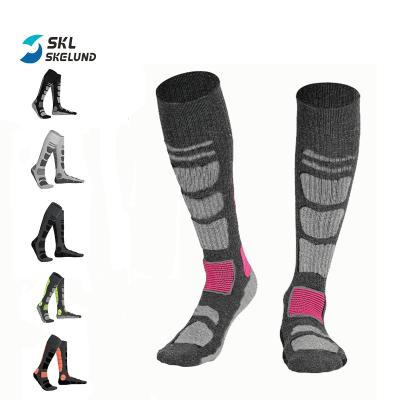 China Outdoor Rise Knee High Ski Socks Warm Cushion Wicking Merino Wool Sports Moisture And Soft Winter Socks for sale