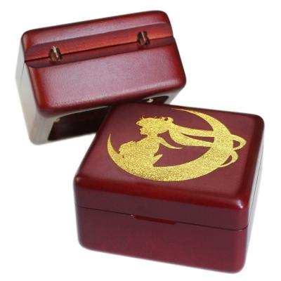 China Professional Wholesale Wine Red Wooden Rocker Arm Music Box Movie Play Sound Melody Music Creative Marketing Gift Custom Carved Souvenir for sale