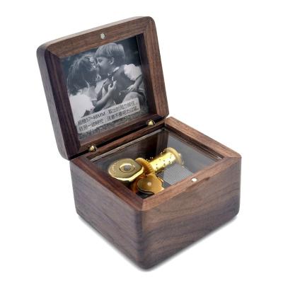 China Wholesale Delicate and Exquisite Laser Engraving Custom Wooden Creative DIY Music Box Photo Music Box Direct Selling From China for sale