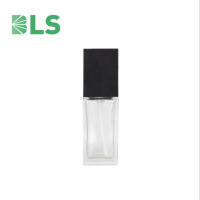 China Fancy 20ml 30ml 40ml Lotion Base Cosmetic Luxury Glass Square Bottle With Black Spray Pump Cap for sale