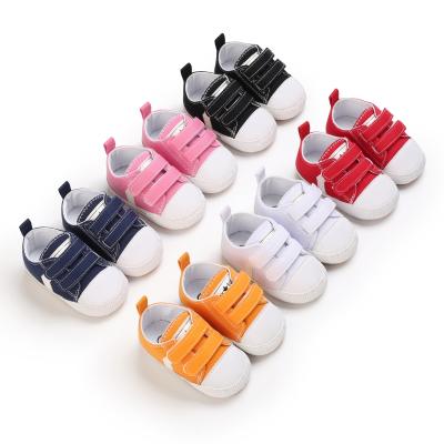 China ODM flat year old baby shoes 0-1 0-18 months boys and girls rubber soles canvas shoes toddler casual shoes for sale