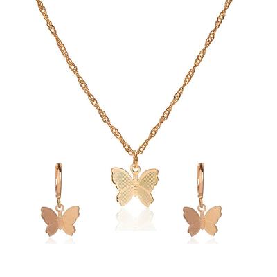 China FASHIONABLE wholesale gold plated stainless steel butterfly necklace and earring jewelry set for women for sale