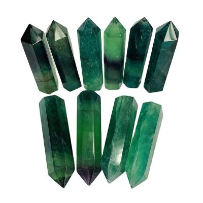 China Europe Wholesale Price Natural Healing Hand Carved Tower Green Fluorite Crystal Point for sale