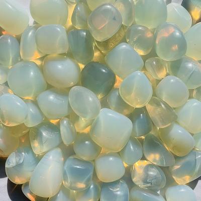 China Europe Natural Price Polished Crystal Tumbled Gravel Chips White Opalite Stone Tumbled for sale