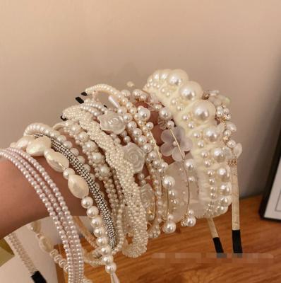 China Fanshion Elegant Headwear Hair Jewelry Bridal Beads Wedding Headpieces White Round Pearl Bridal Hair Band For Women for sale