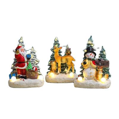 China Worlwide New Christmas Decorations Santa Claus Snowman Deer Resin Open Ornaments Christmas Luminous Gifts for sale