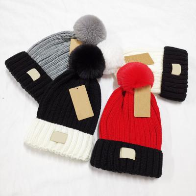 China COMMON Acrylic Winter Hats Caps Warm Plain Dyed Pom Pom Knitted Beanie Hat Color Matching for sale